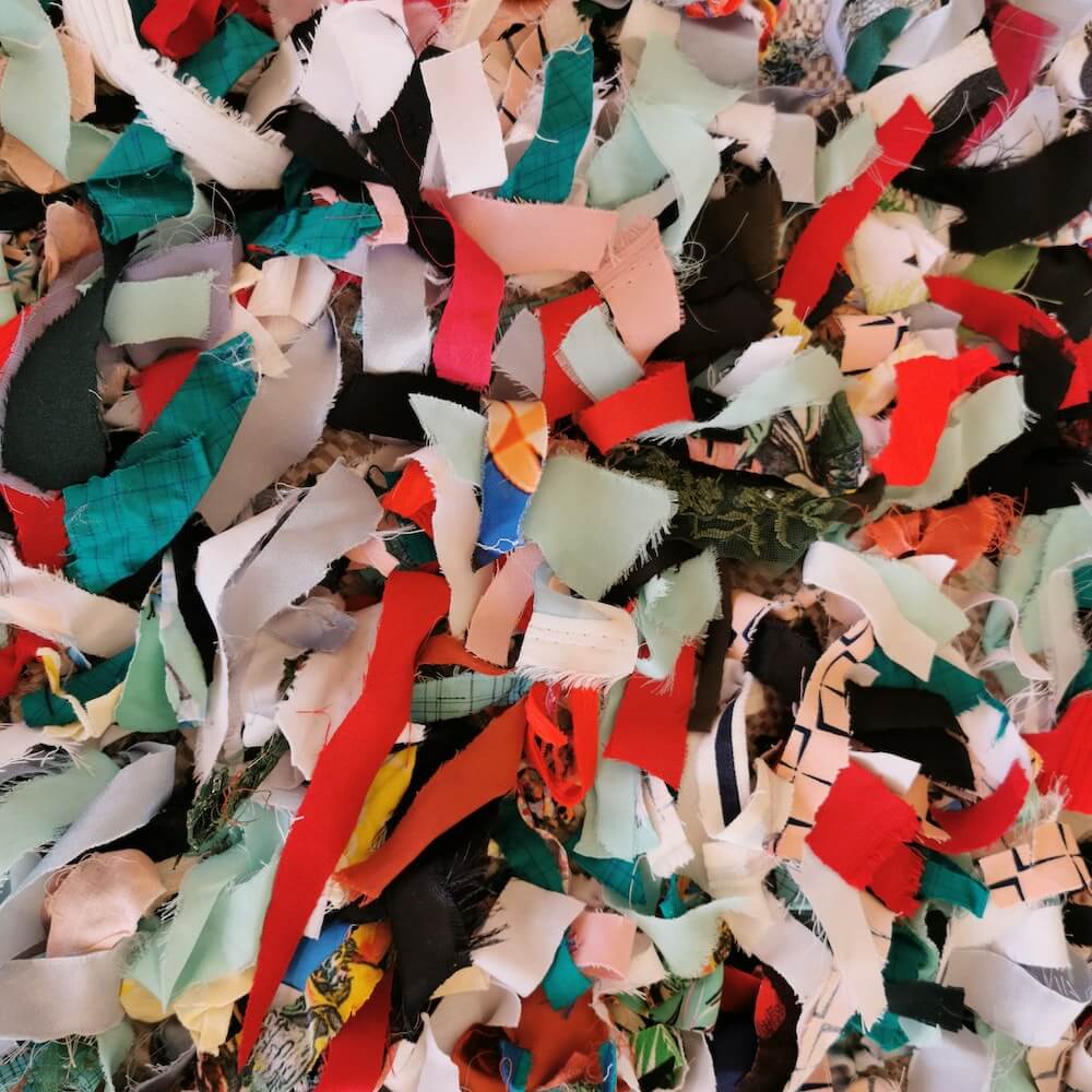 Shredded pieces of fabric in various colours and patterns