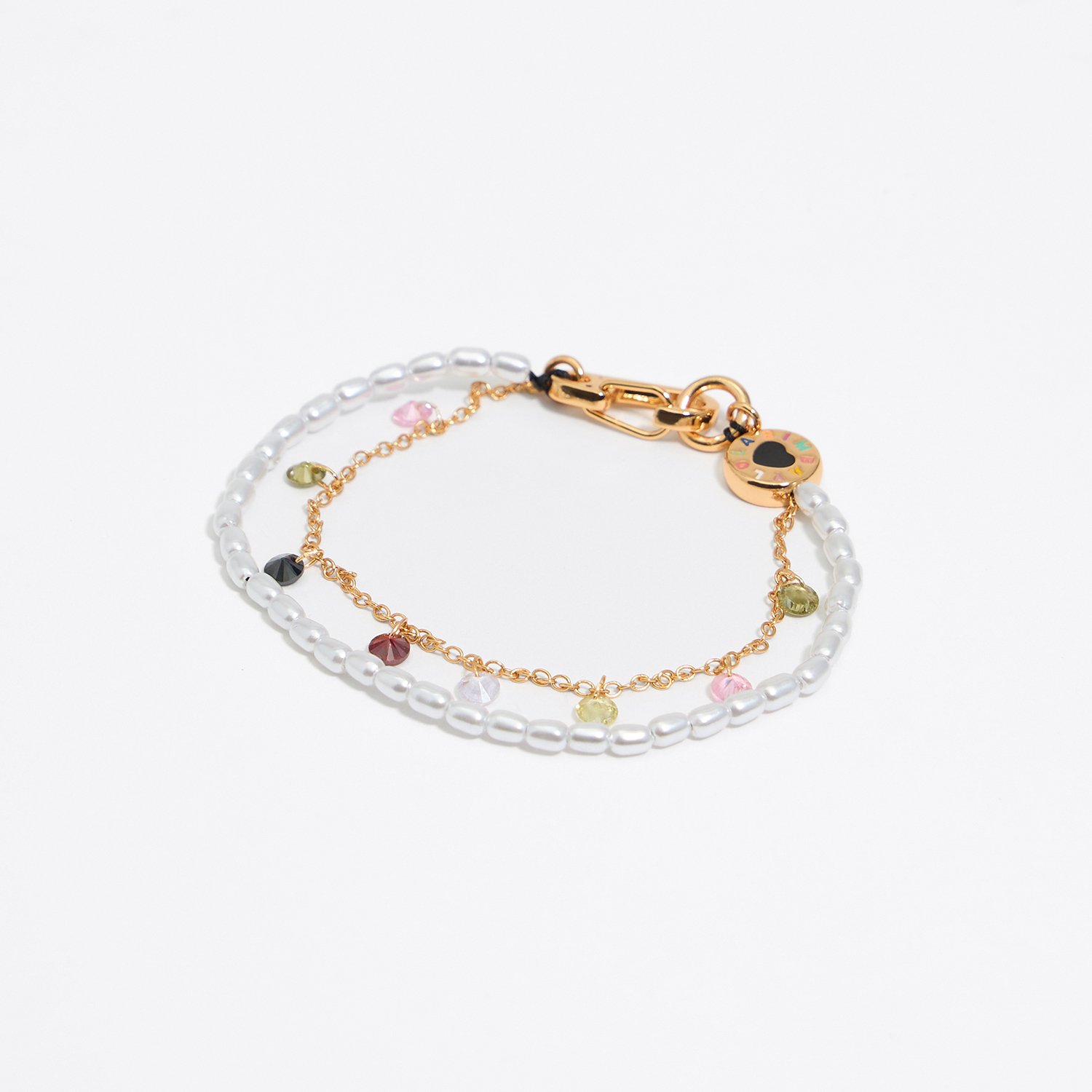 Photograph of BIMBA Y LOLA Pearls and crystals logo heart bracelet