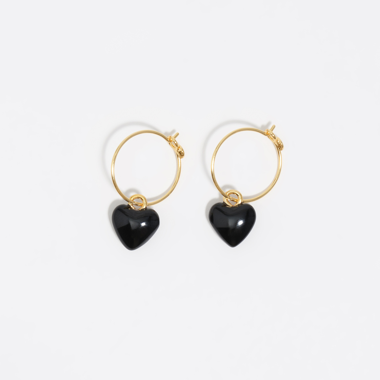 BIMBA Y LOLA Gold hoop earrings and black heart