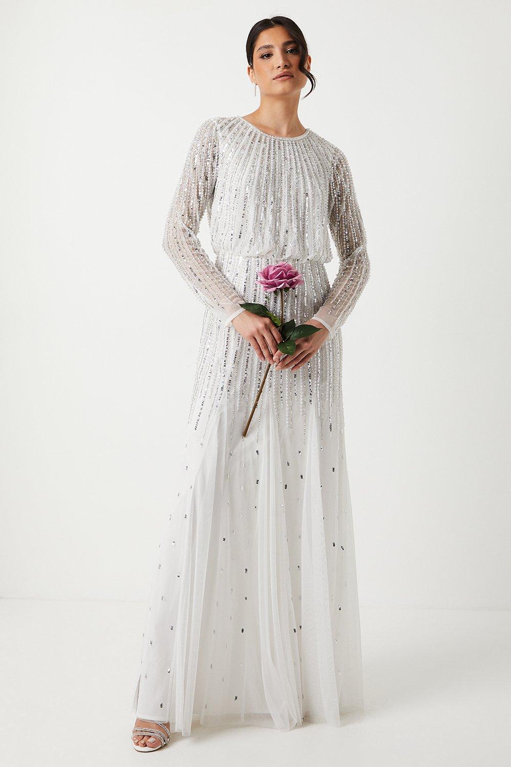 Photograph of Coast Linear Sequin Embellished Long Sleeve Wedding Dress