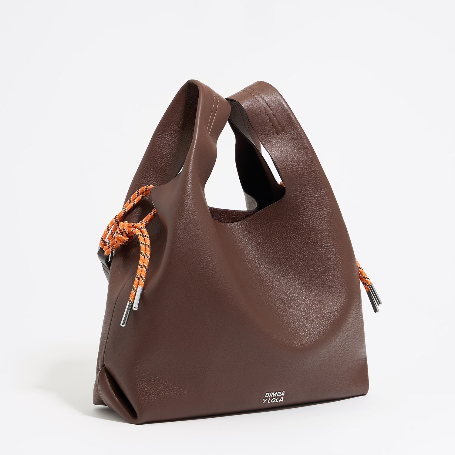 Photograph of BIMBA Y LOLA Medium brown leather Paper bag